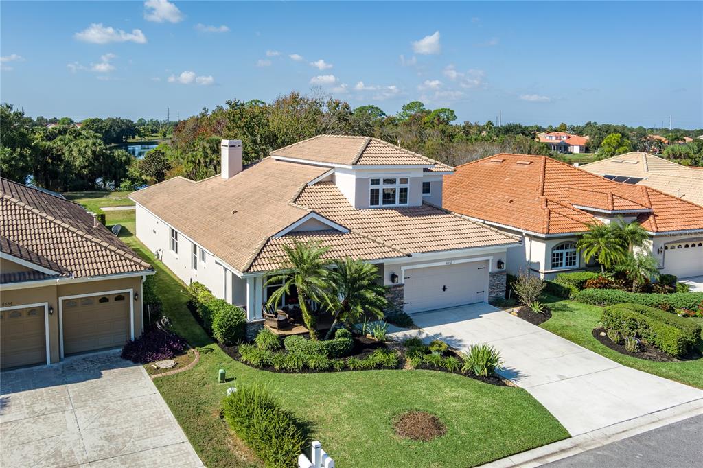 6552 Tailfeather Way Bradenton, FL 34203 - Photo 45 of 65 an aerial view of a house with a yard