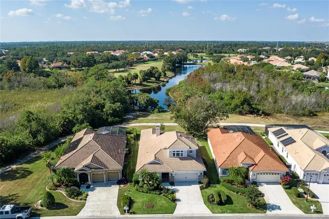 a view of a swimming pool with a lounge chairs