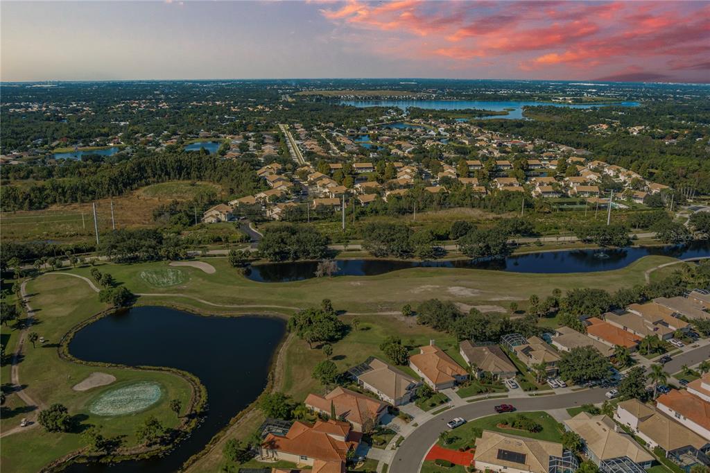6552 Tailfeather Way Bradenton, FL 34203 - Photo 51 of 65 an aerial view of residential building and lake