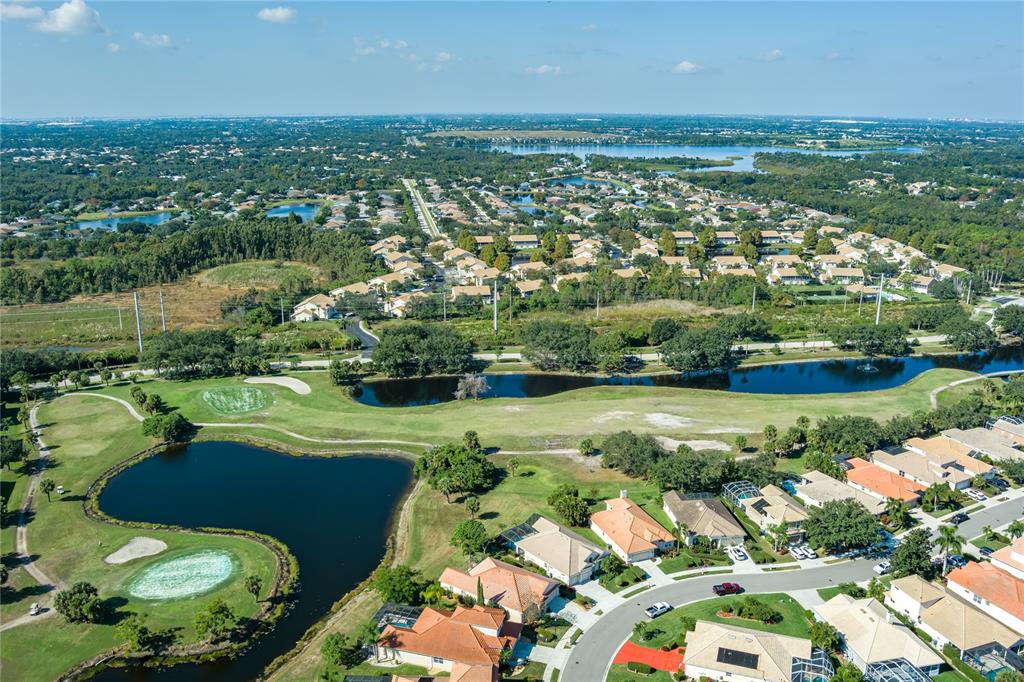 6552 Tailfeather Way Bradenton, FL 34203 - Photo 52 of 65 an aerial view of a houses with a lake view