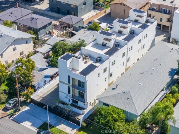 an aerial view of a building with outdoor space
