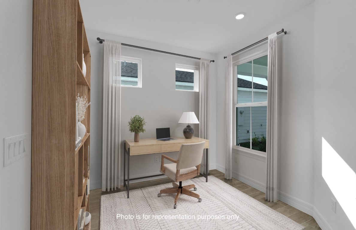608 Ecliptic Loop Yulee, FL 32097 - Photo 21 of 45 a view of a workspace with furniture and a window