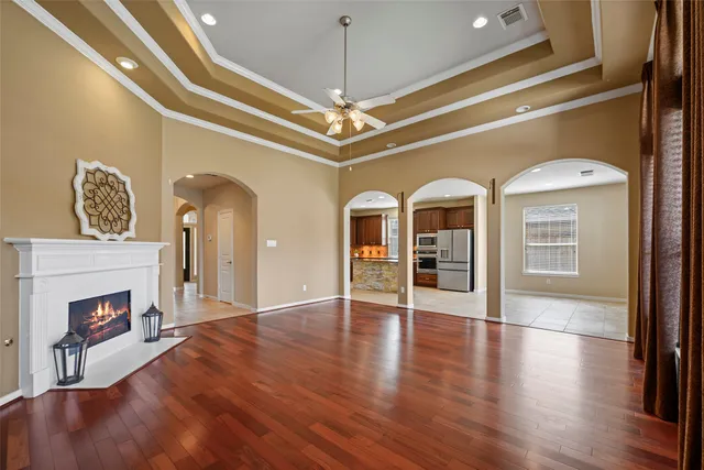 a view of an entryway with wooden floor