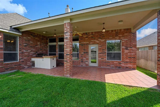 a view of a porch with a yard