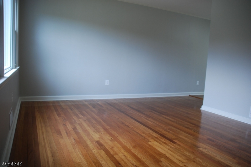 88 Rosedale Avenue Madison, NJ 07940 - Photo 4 of 10 a view of a room with wooden floor