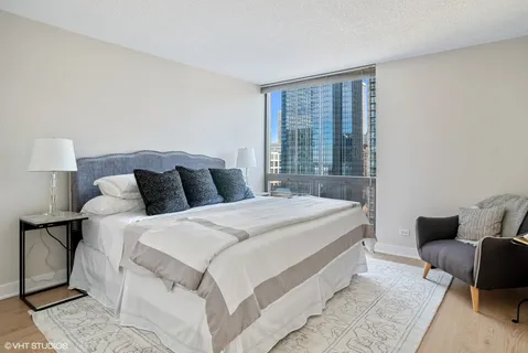 a bathroom with a sink toilet and a mirror