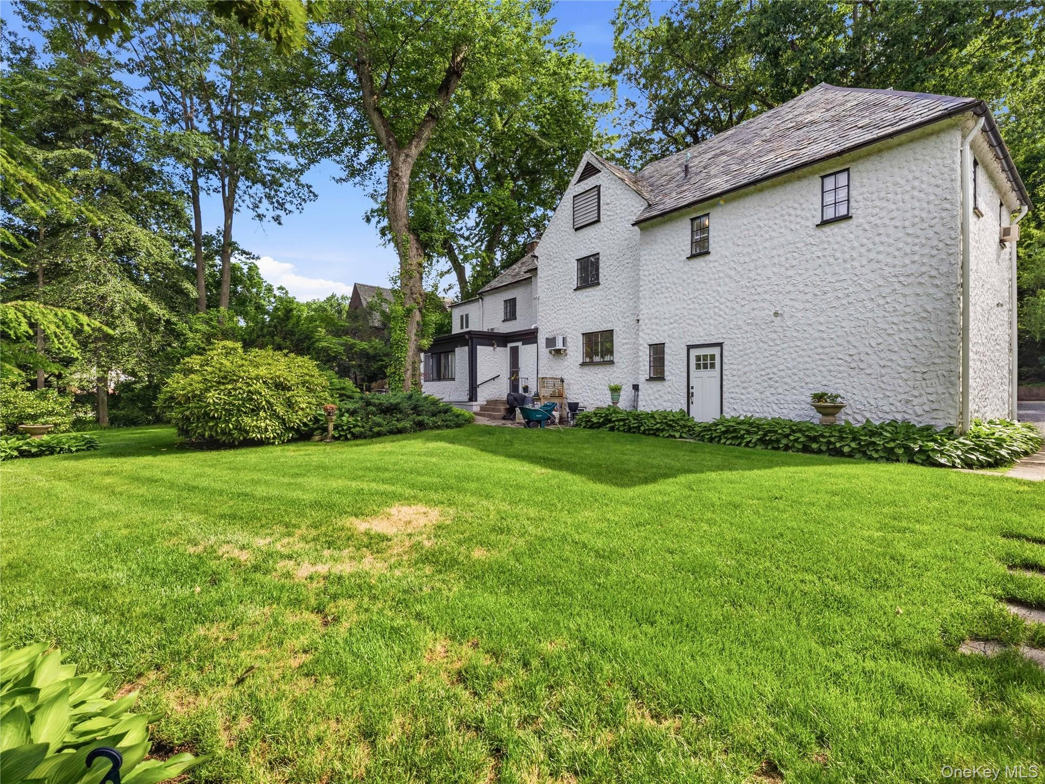 89 Bayview Avenue Great Neck, NY 11021 - Photo 28 of 38 Back Of House With Slate Roof