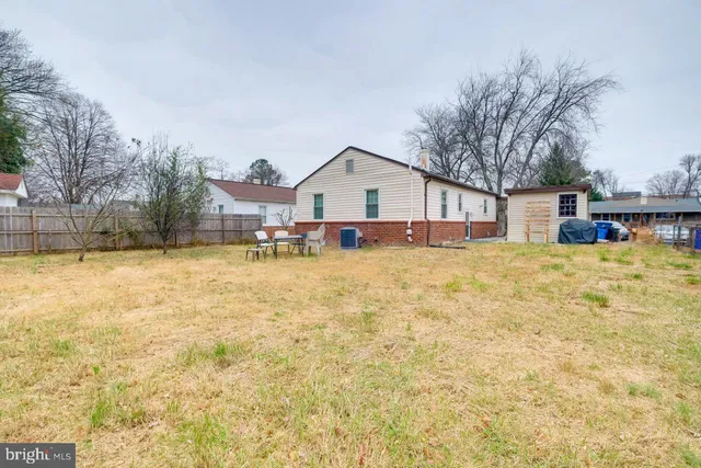 a view of a house with snow on a yard