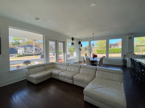 a view of entryway with wooden floor