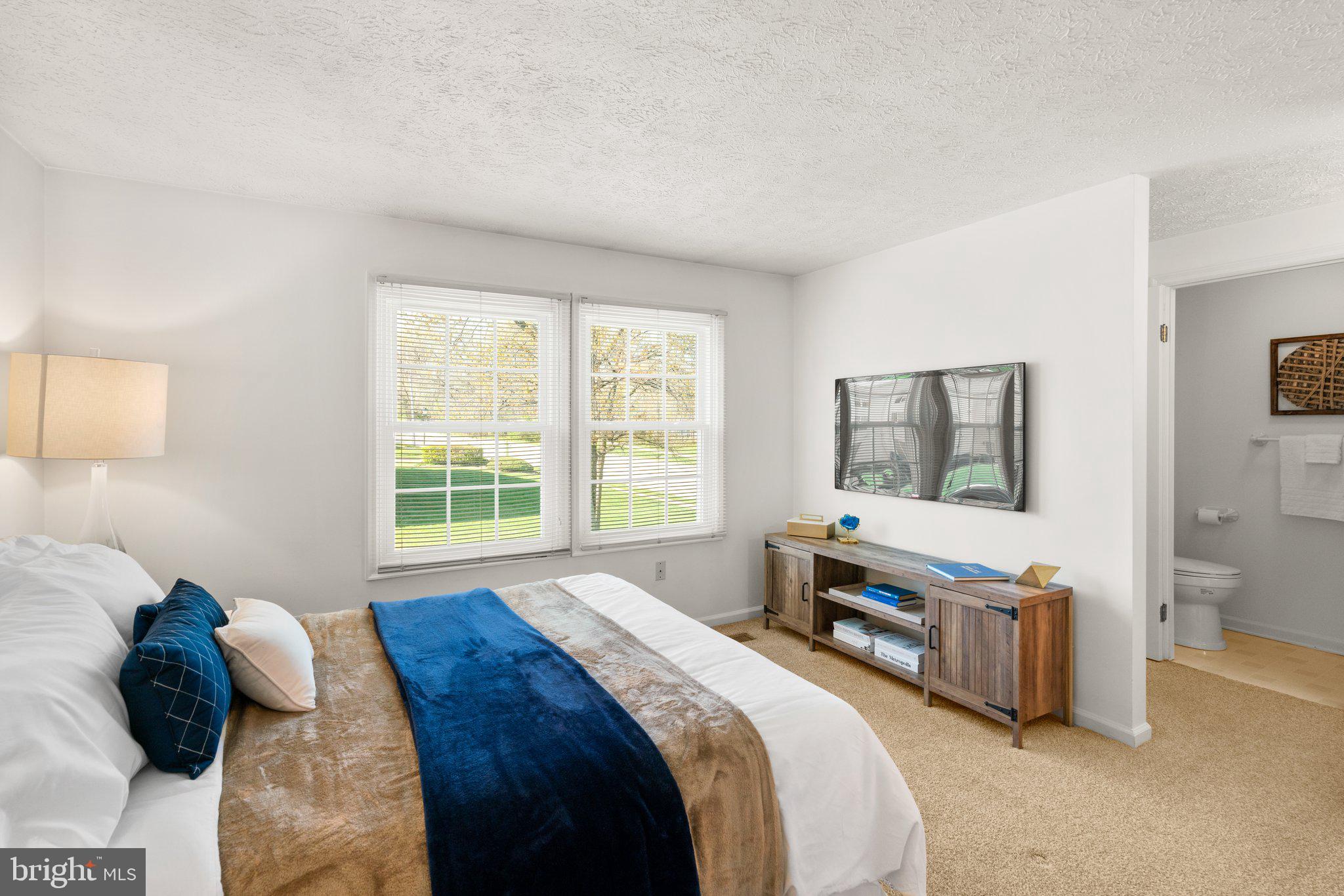 2 Ramsgate Court Halethorpe, MD 21227 - Photo 12 of 30 a bedroom with a bed and wooden floor