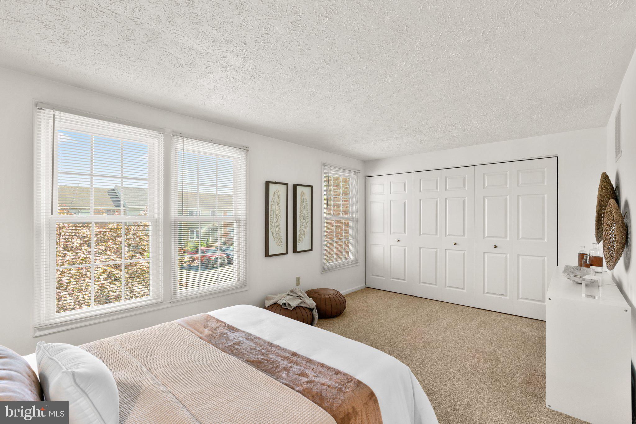 2 Ramsgate Court Halethorpe, MD 21227 - Photo 16 of 30 a bedroom with a bed a window and walk in closet
