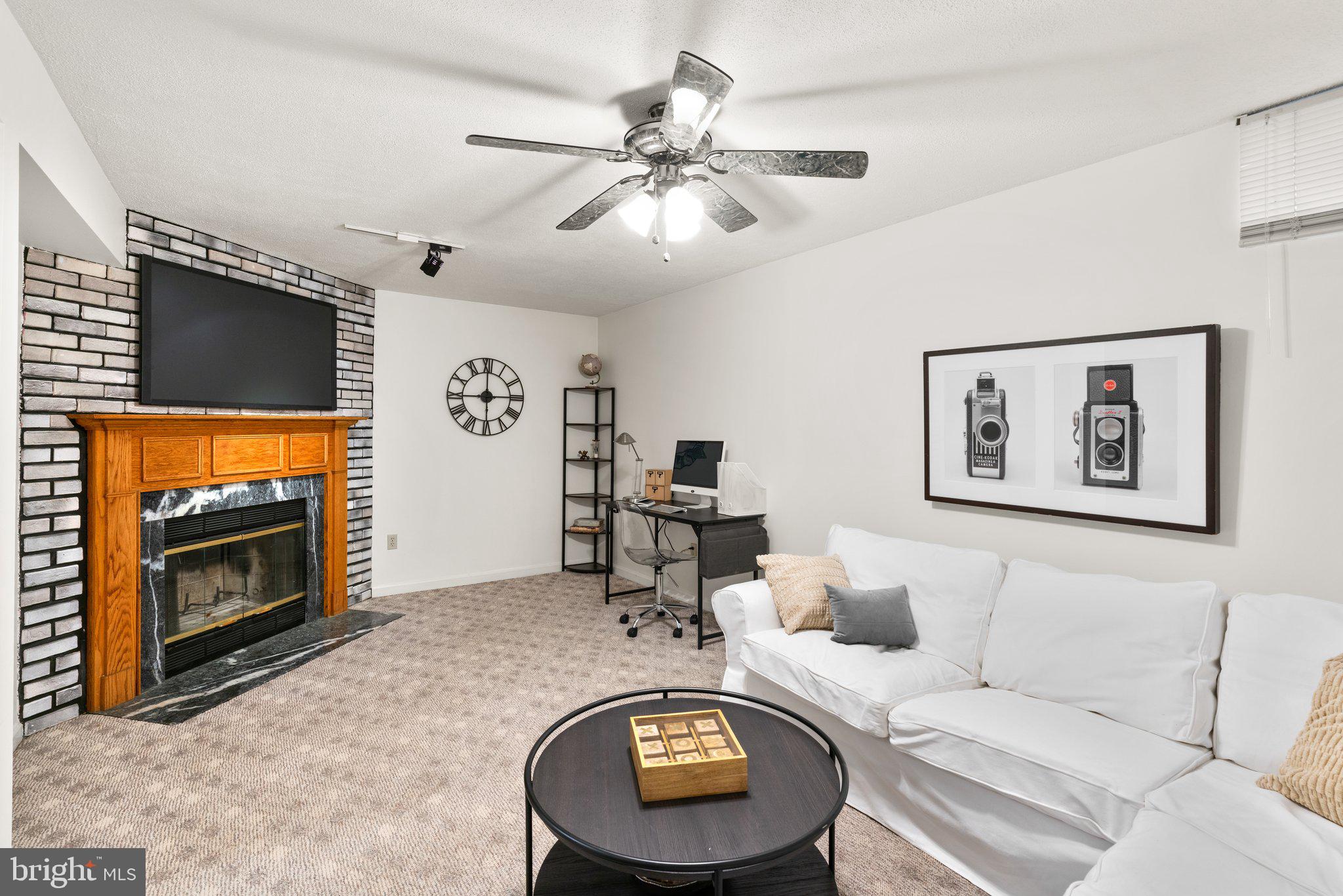 2 Ramsgate Court Halethorpe, MD 21227 - Photo 20 of 30 a living room with furniture and a fireplace