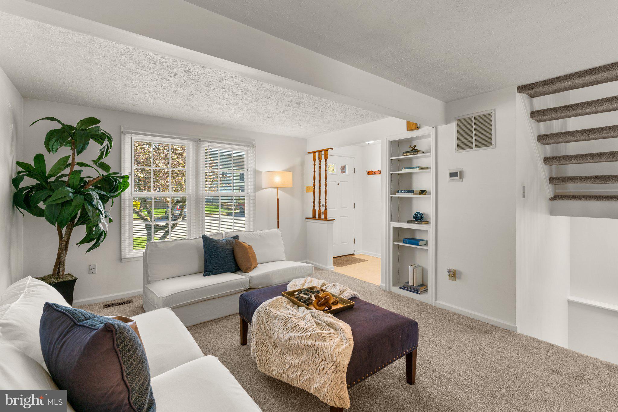 2 Ramsgate Court Halethorpe, MD 21227 - Photo 2 of 30 a living room with furniture and a potted plant