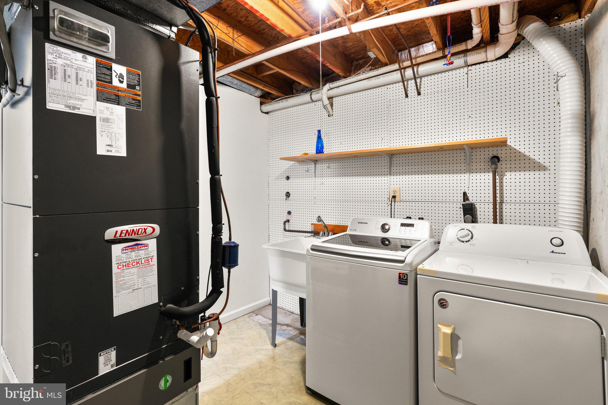 2 Ramsgate Court Halethorpe, MD 21227 - Photo 23 of 30 a utility room with dryer and washer