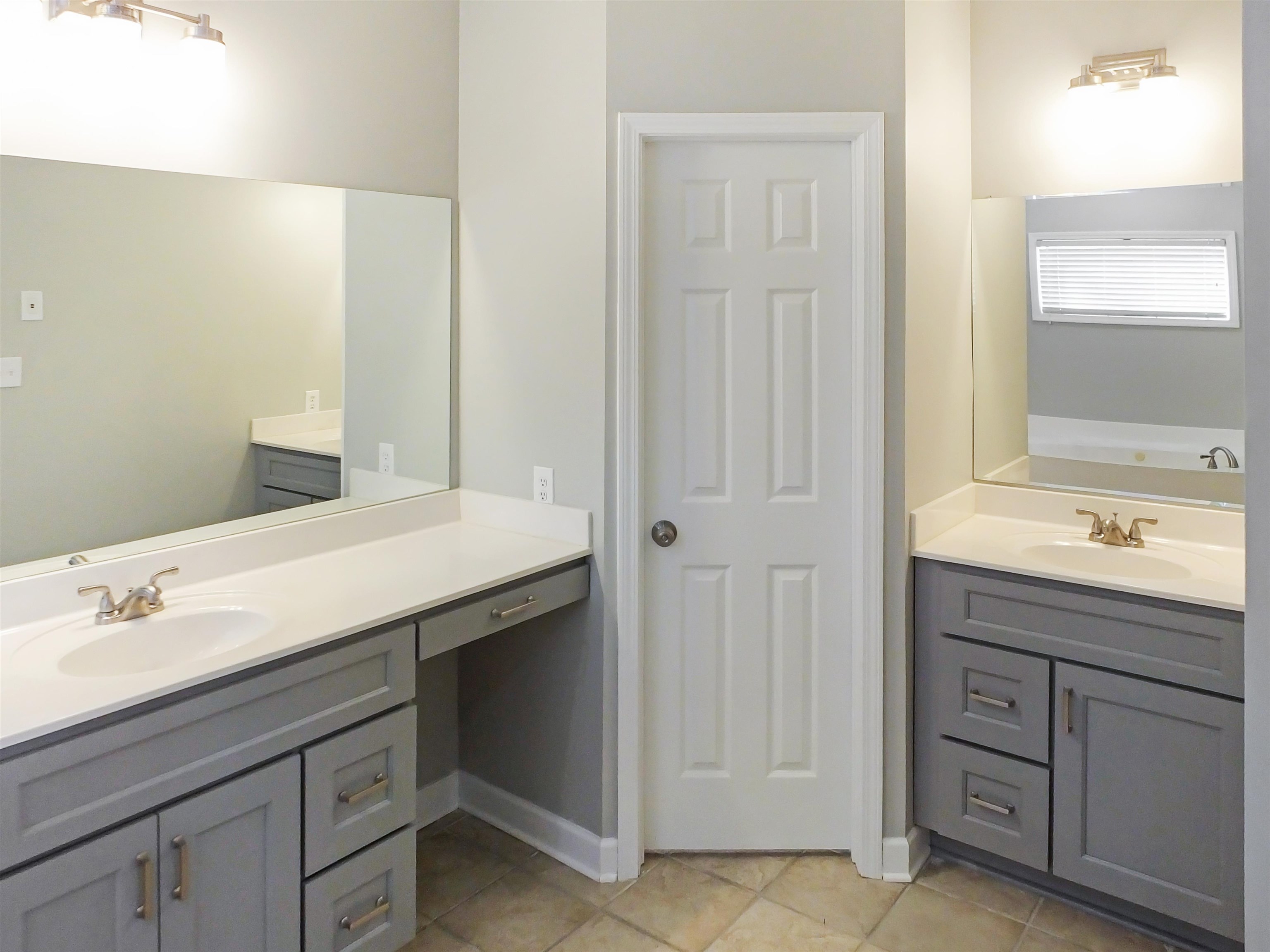4323 Country Bridge Road Lakeland, TN 38002 - Photo 25 of 35 Full bath featuring tile patterned flooring, baseboards, vanity, and a garden tub
