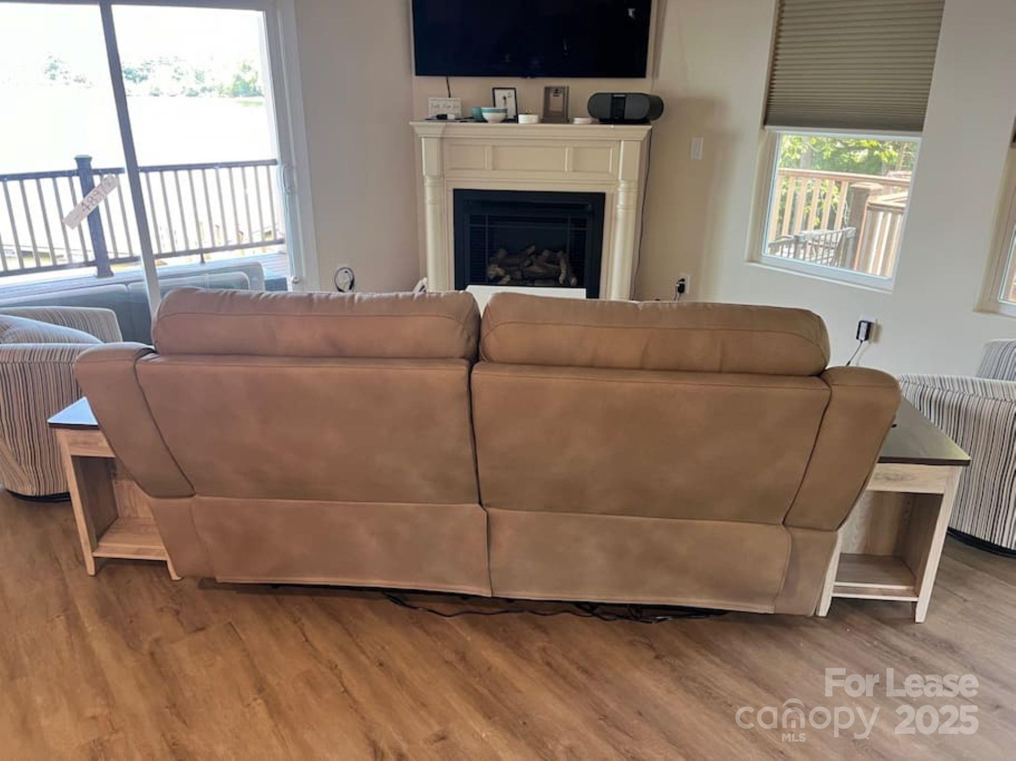 4897 Kiser Island Road, Unit A Terrell, NC 28682 - Photo 6 of 25 a living room with furniture and a fireplace