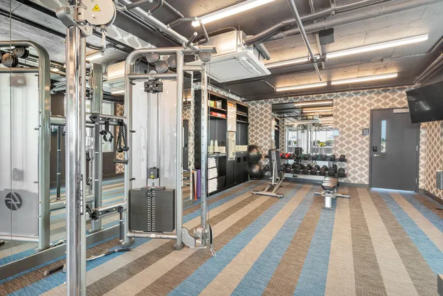 a view of a room with gym equipment