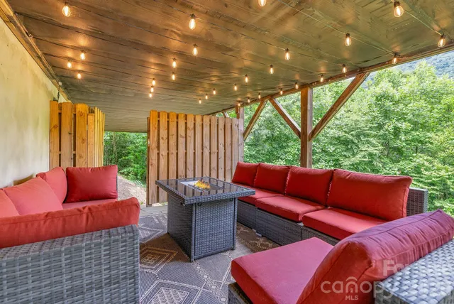 a outdoor living space with furniture and garden view