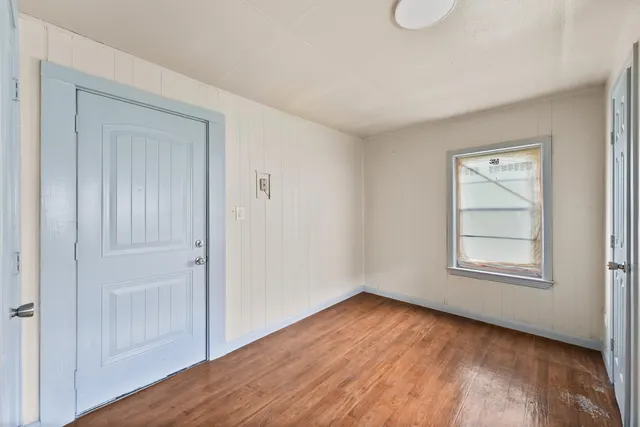 a view of a backyard with sitting area