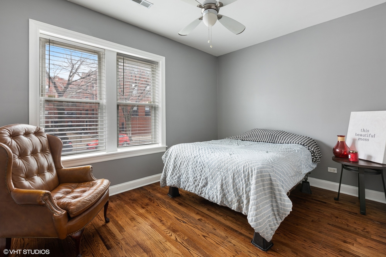 3522 North Racine Avenue, Unit 1N Chicago, IL 60657 - Photo 12 of 17 a bedroom with a bed and wooden floor