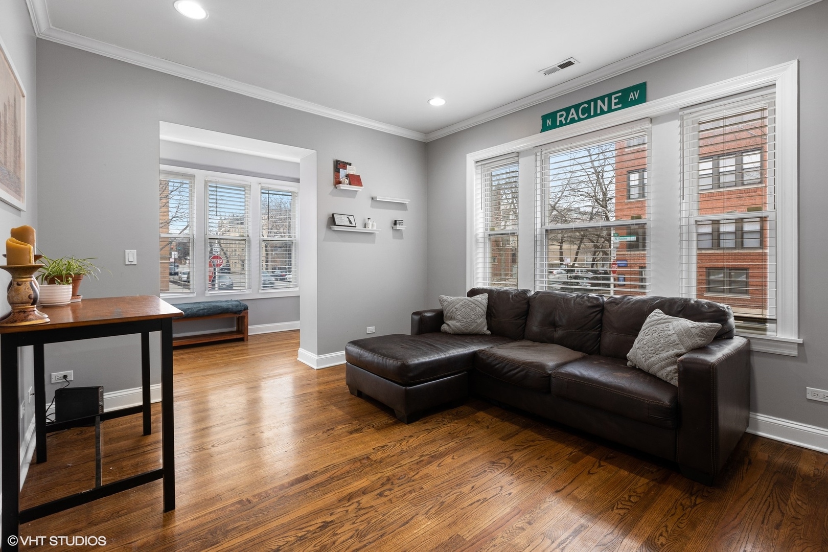 3522 North Racine Avenue, Unit 1N Chicago, IL 60657 - Photo 2 of 17 a living room with furniture and a large window