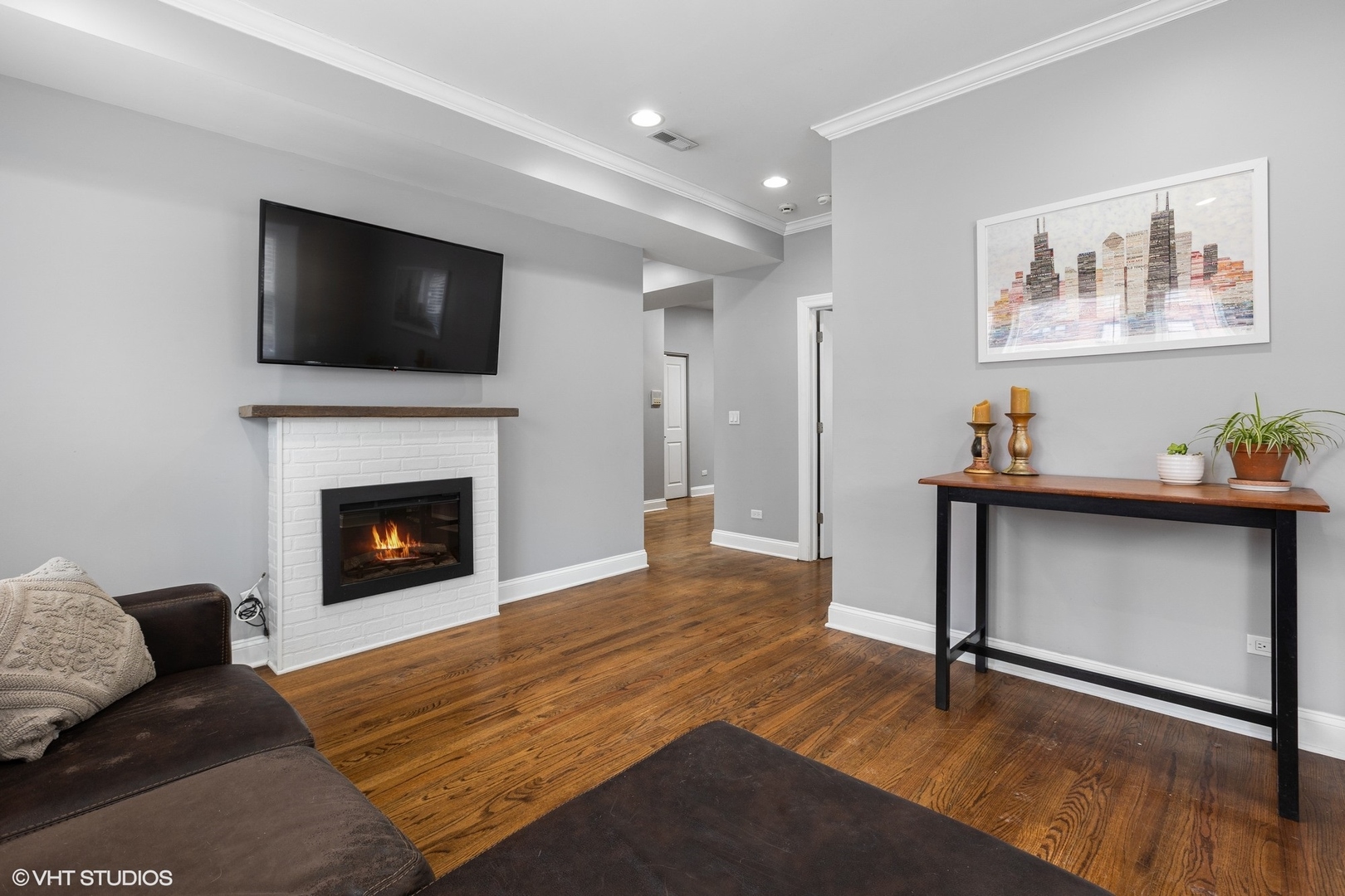3522 North Racine Avenue, Unit 1N Chicago, IL 60657 - Photo 4 of 17 a living room with furniture and a fireplace