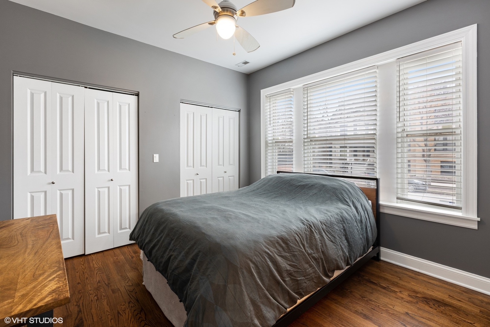 3522 North Racine Avenue, Unit 1N Chicago, IL 60657 - Photo 10 of 17 a bedroom with a bed next to a window