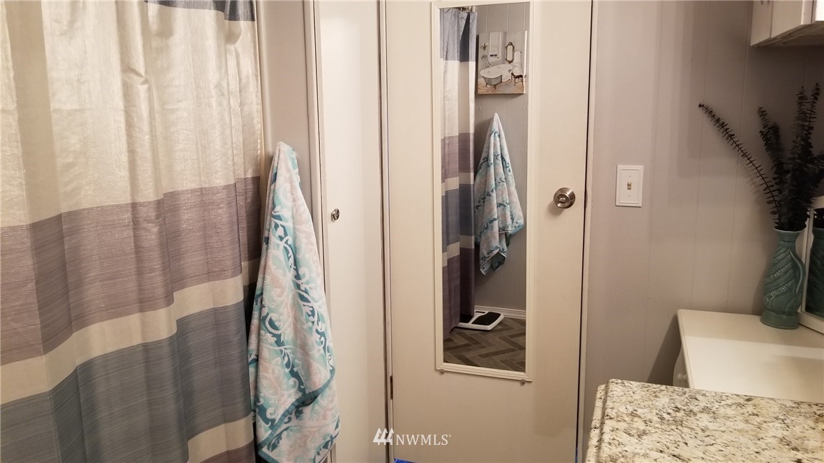 171 Spath Road Sequim, WA 98382 - Photo 17 of 21 a bathroom with a bathtub and shower