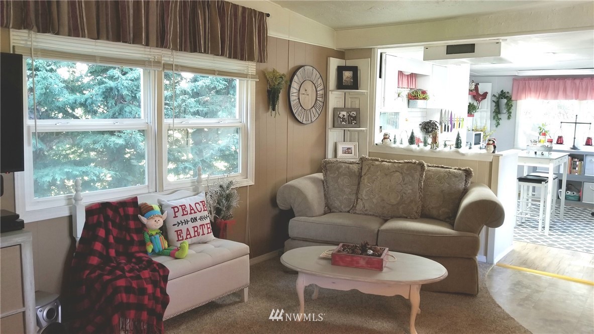 171 Spath Road Sequim, WA 98382 - Photo 5 of 21 a living room with furniture and a large window