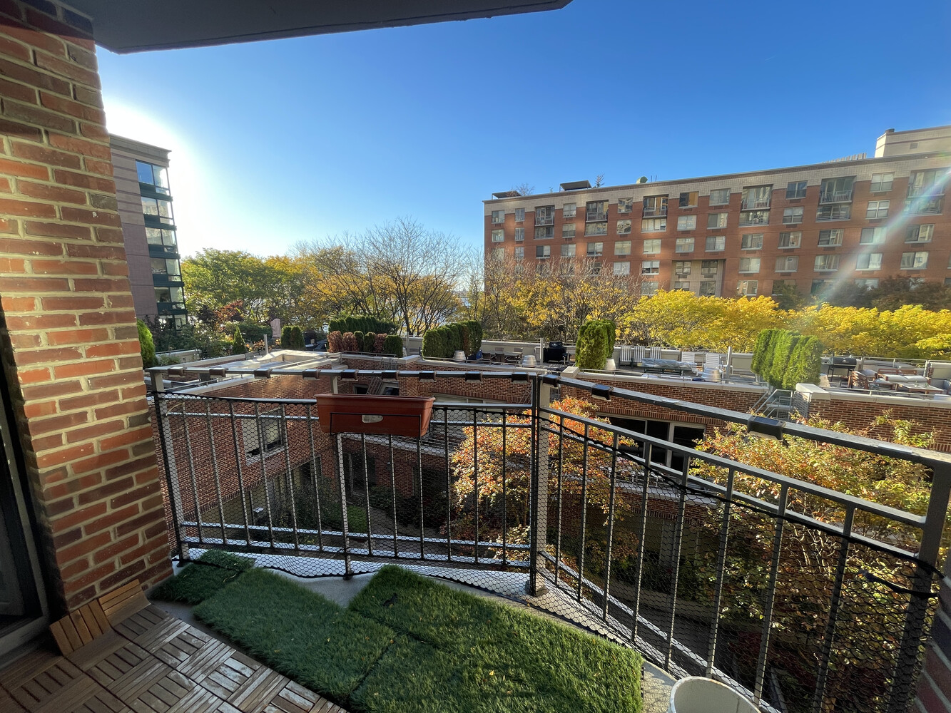 2 South End Avenue, Unit 5T Manhattan, NY 10280 - Photo 2 of 9 a view of a balcony with floor to ceiling windows and outdoor space