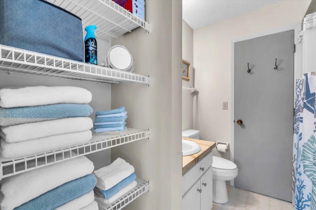 331 Burke Road Venice, FL 34293 - Photo 24 of 29 a bathroom with a toilet sink and mirror