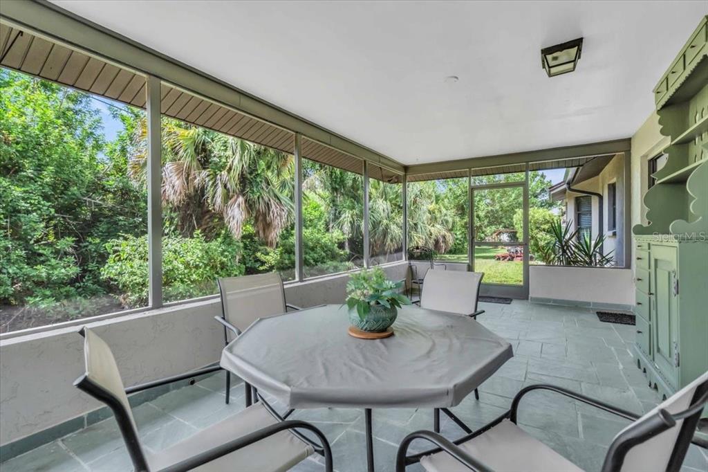 331 Burke Road Venice, FL 34293 - Photo 26 of 29 a view of a dining room with furniture window and outside view
