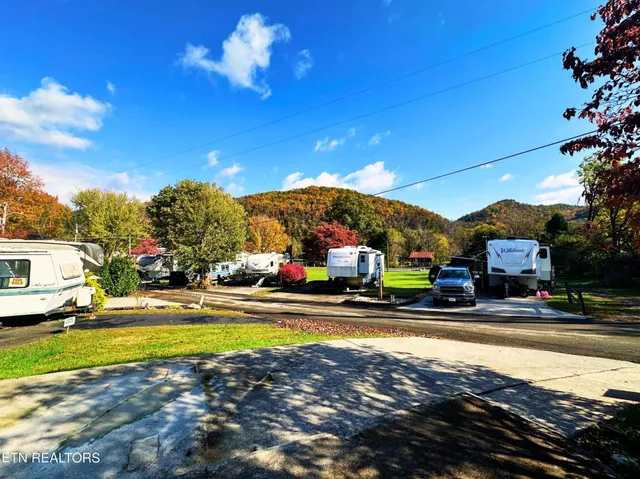 a view of a house with outdoor space and sitting area