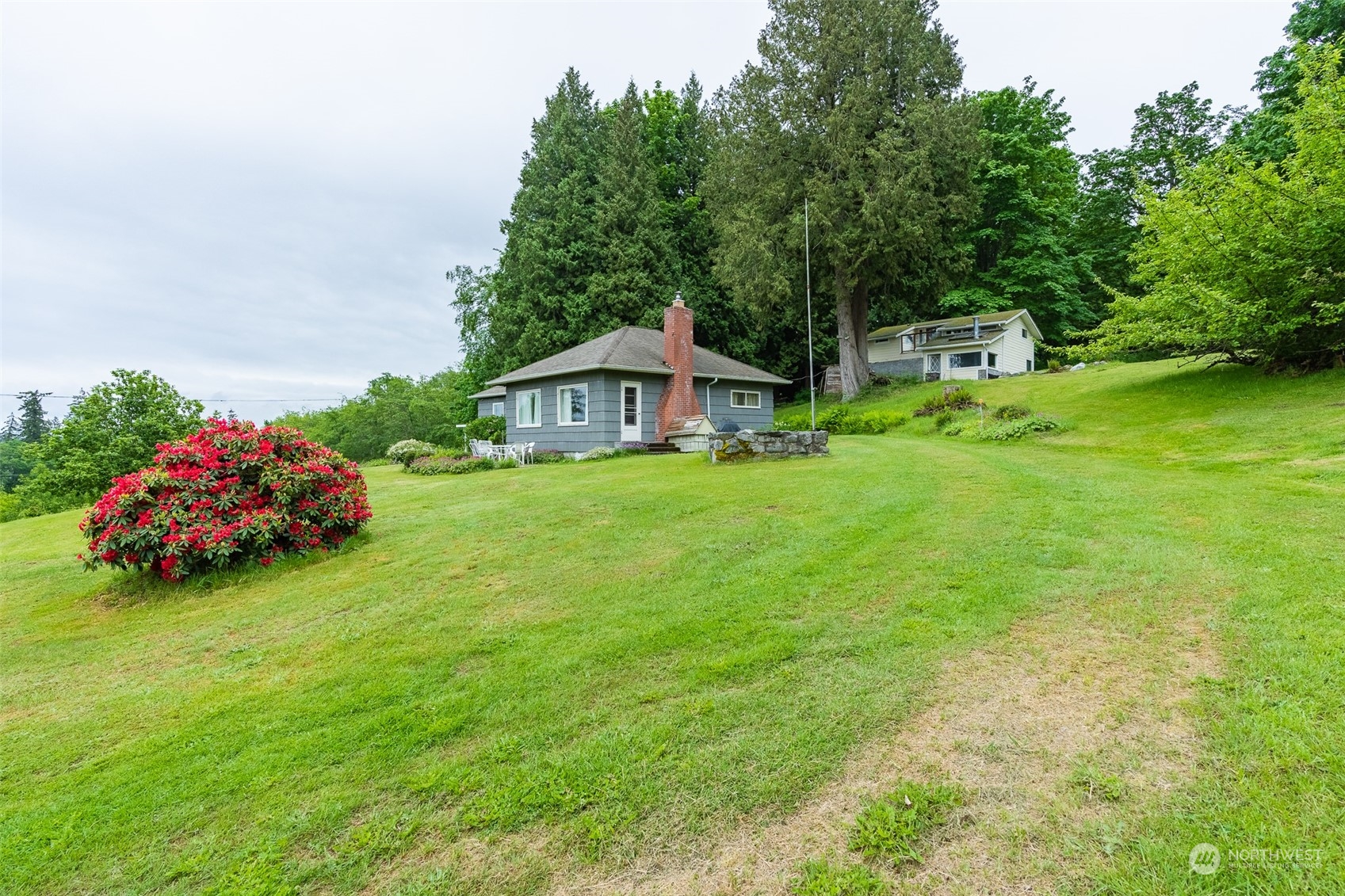 5273 Drayton Harbor Road Blaine, WA 98230 - Photo 13 of 33 a view of a house with a yard and garden