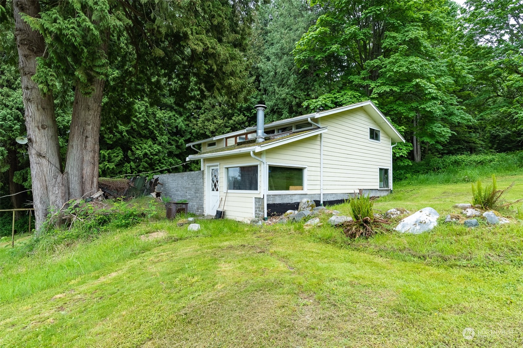 5273 Drayton Harbor Road Blaine, WA 98230 - Photo 15 of 33 a view of a house with backyard