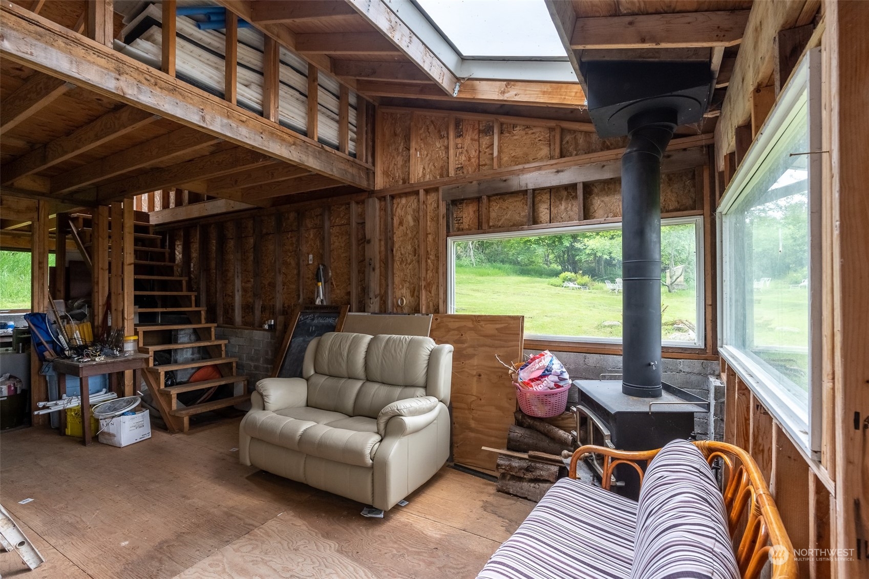 5273 Drayton Harbor Road Blaine, WA 98230 - Photo 20 of 33 a living room with furniture and a large window