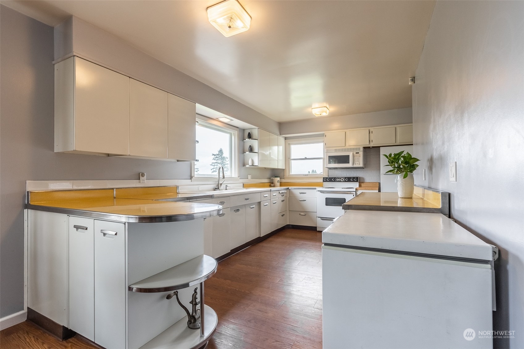 5273 Drayton Harbor Road Blaine, WA 98230 - Photo 30 of 33 a kitchen with a sink a counter top space and cabinets