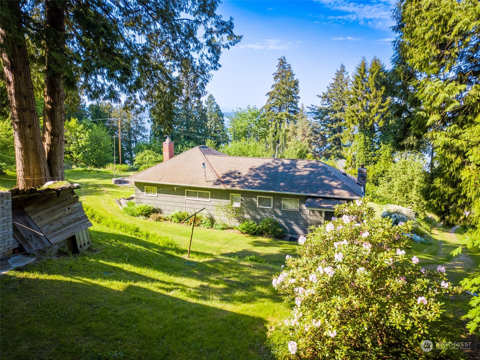 5273 Drayton Harbor Road Blaine, WA 98230 - Photo 3 of 33 a view of a swimming pool with a yard
