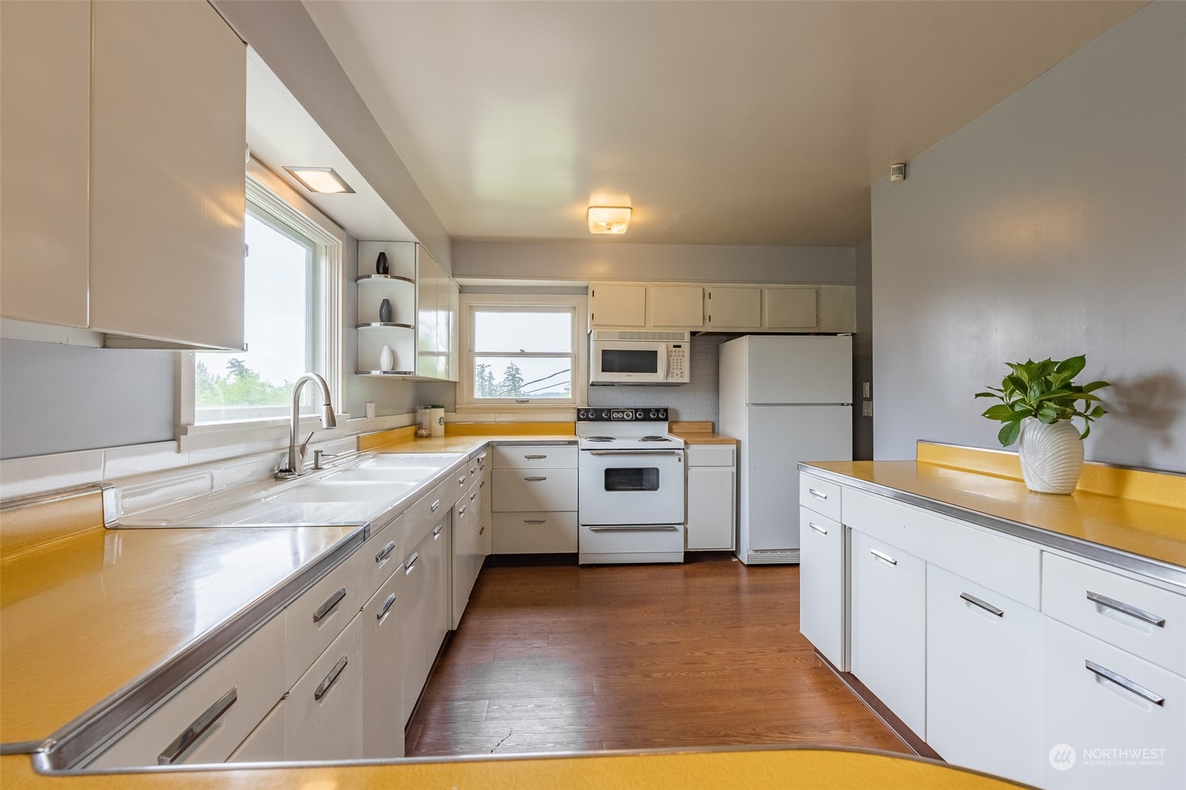 5273 Drayton Harbor Road Blaine, WA 98230 - Photo 31 of 33 a kitchen with white cabinets and white appliances