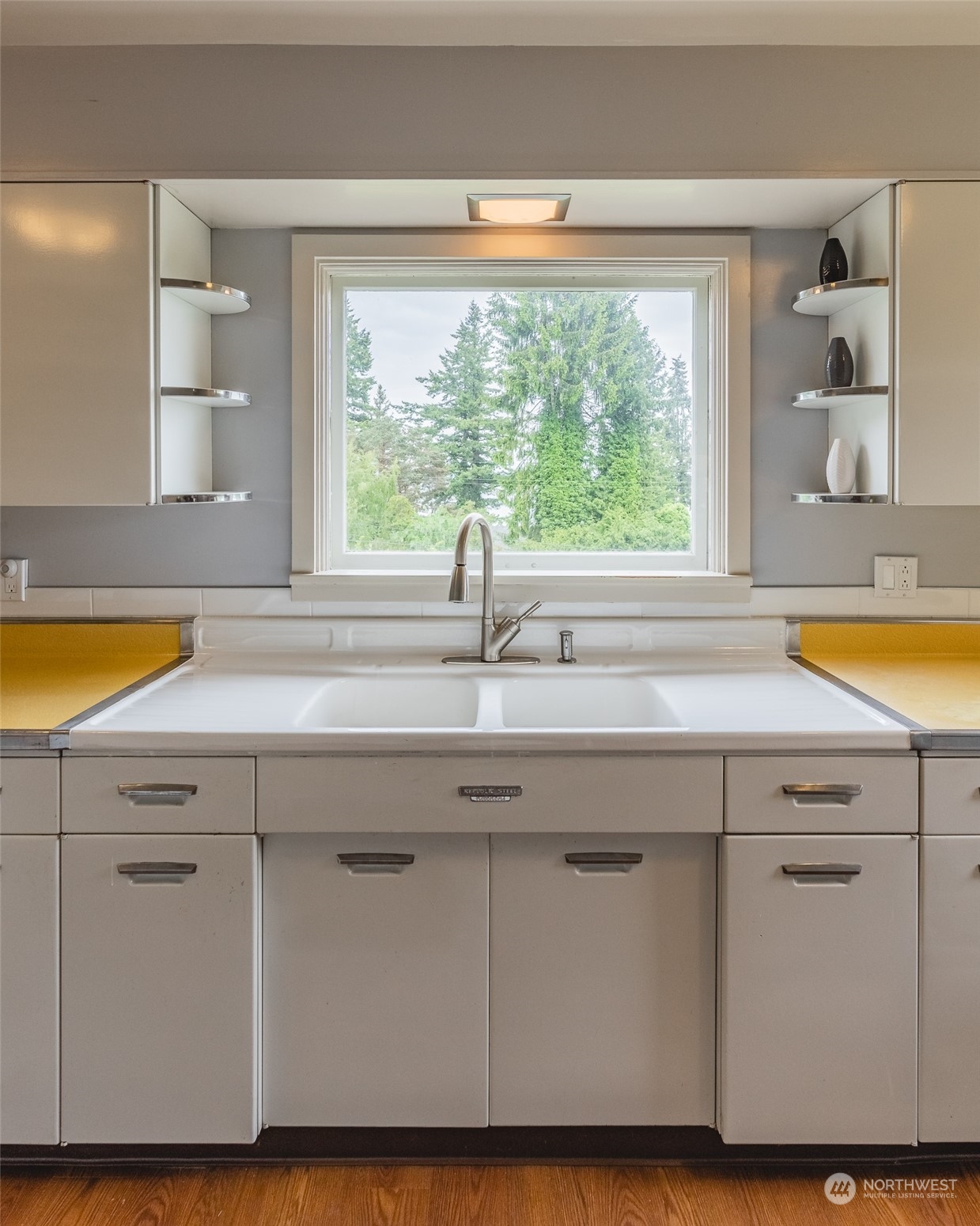 5273 Drayton Harbor Road Blaine, WA 98230 - Photo 33 of 33 a kitchen with a sink and a large window