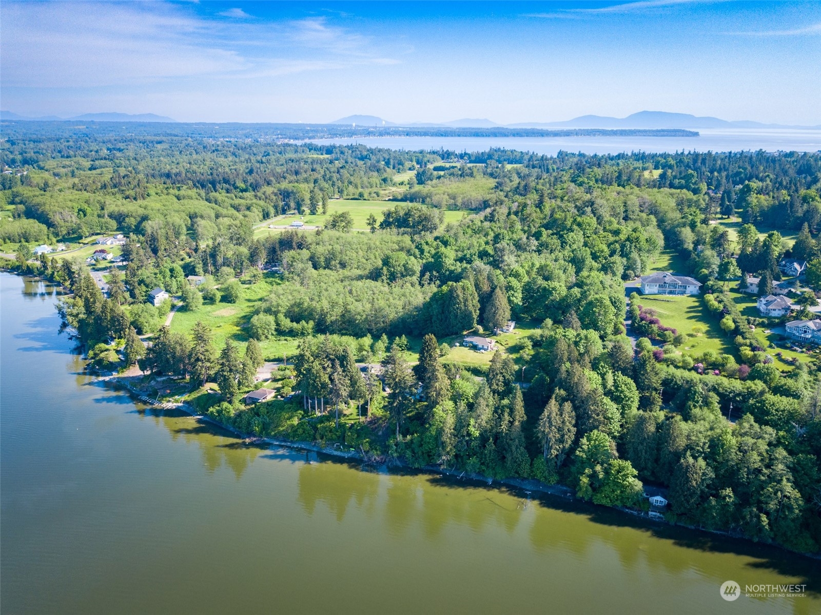 5273 Drayton Harbor Road Blaine, WA 98230 - Photo 5 of 33 a view of a lake with a mountain in the background