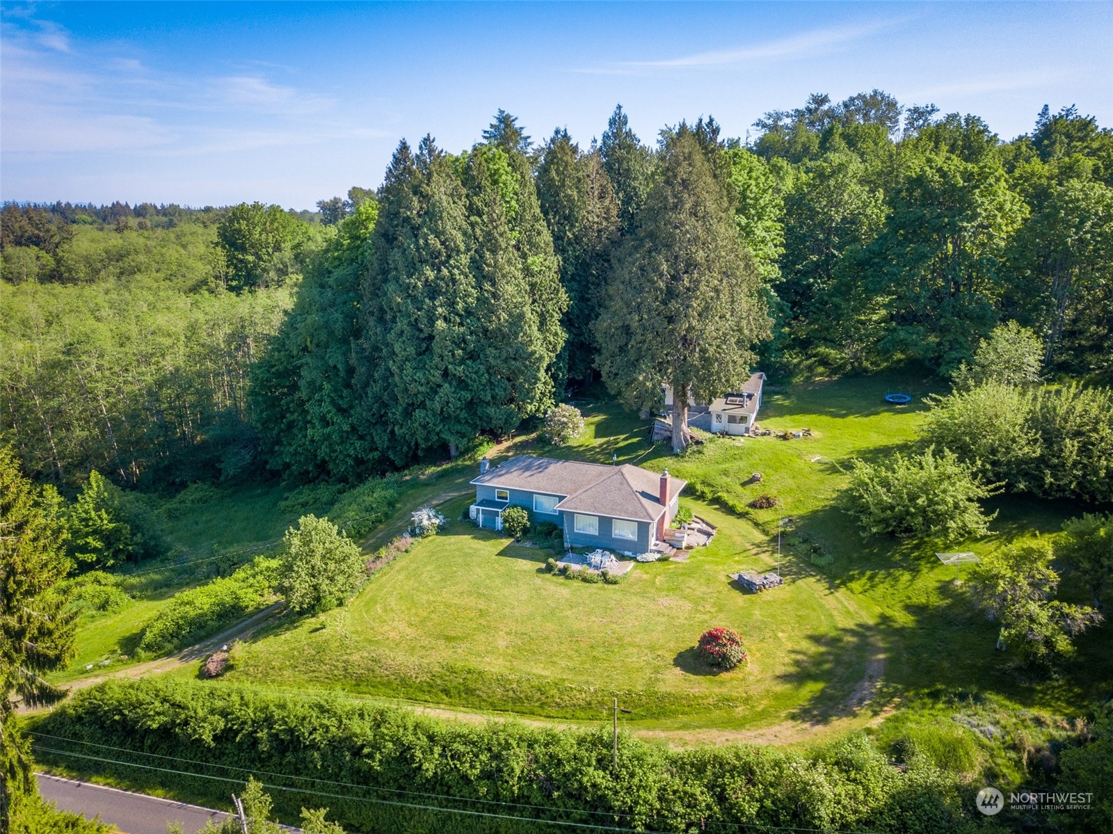 5273 Drayton Harbor Road Blaine, WA 98230 - Photo 6 of 33 a view of a swimming pool with a yard