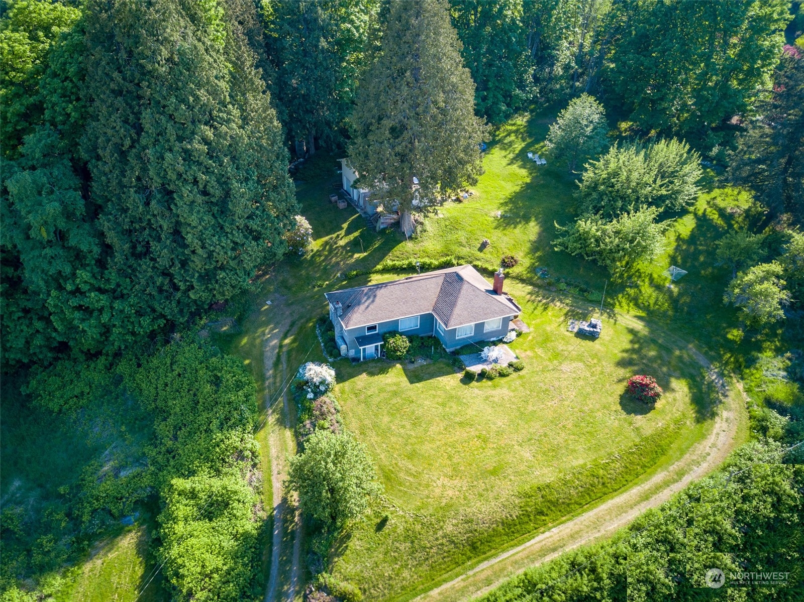 5273 Drayton Harbor Road Blaine, WA 98230 - Photo 7 of 33 an aerial view of residential house with an outdoor space and seating