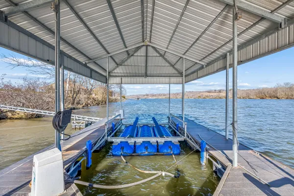 a view of a lake with a big yard
