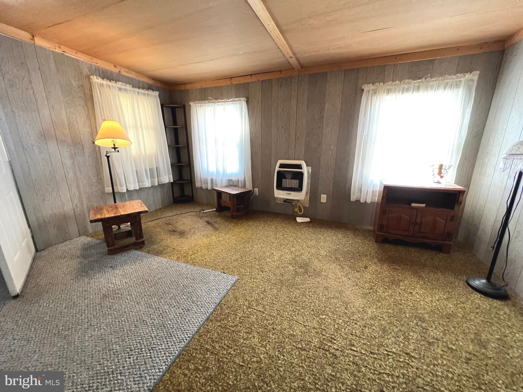 1314 Spring Garden Road Millville, NJ 08332 - Photo 7 of 10 a view of a livingroom with furniture and a window