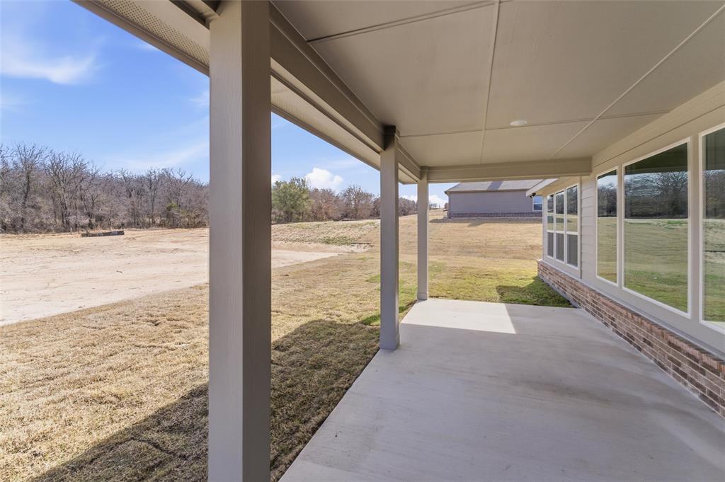 144 Oak Grv Way Springtown, TX 76082 - Photo 22 of 27 a view of a room with an ocean view