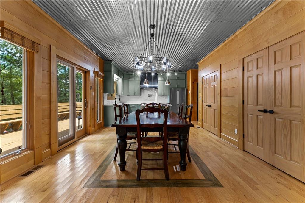 394 Ferrell-Tatum Road LaGrange, GA 30240 - Photo 13 of 68 a view of a dining room with furniture window and wooden floor