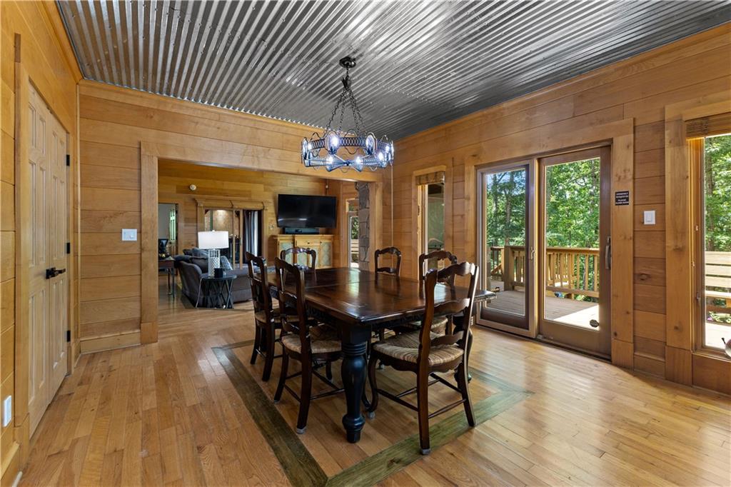394 Ferrell-Tatum Road LaGrange, GA 30240 - Photo 19 of 68 a view of a dining room with furniture wooden floor and chandelier
