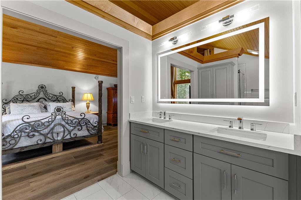 394 Ferrell-Tatum Road LaGrange, GA 30240 - Photo 23 of 68 a bathroom with a sink and a mirror