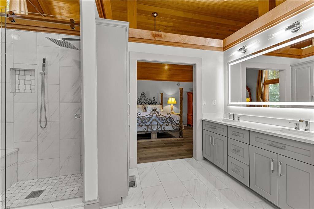 394 Ferrell-Tatum Road LaGrange, GA 30240 - Photo 26 of 68 a view of a bathroom with tub and shower